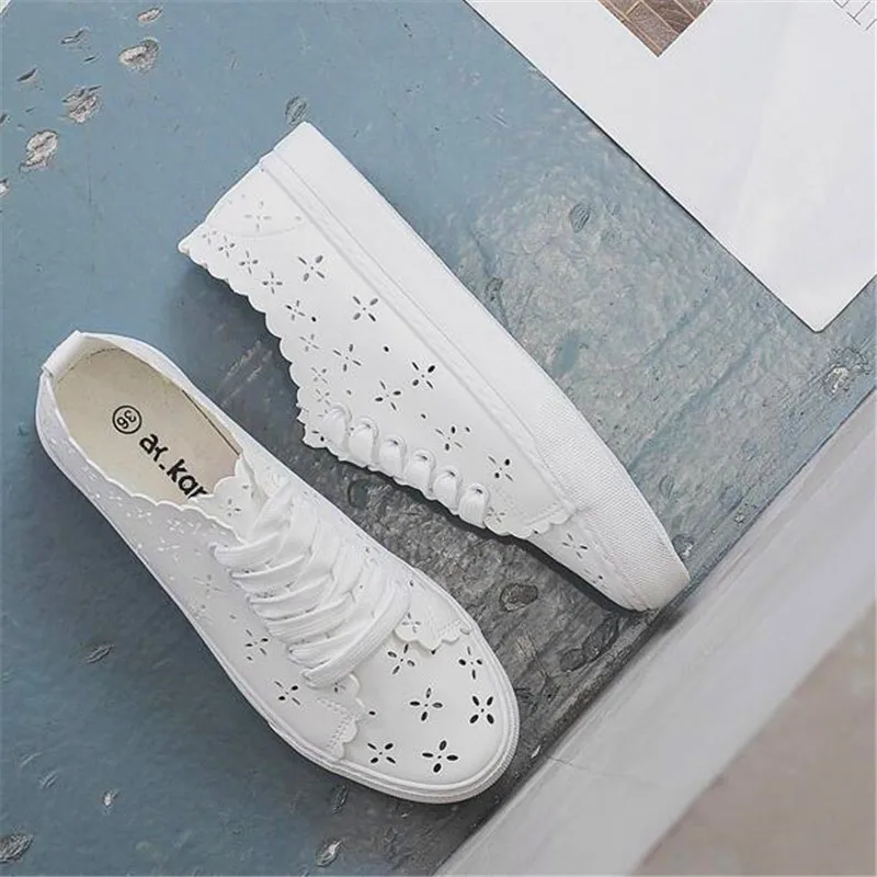 

Summer breathable white shoes 2021 new hollow students a pedal flat bottom wild lazy women's shoes