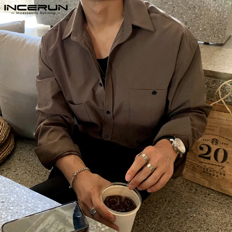 

Для мужчин рубашка 2021 отложной воротник свободные Кнопка Блузка с длинными рукавами Повседневное Топы Карманы Уличная сплошной Цвет Camisa ...