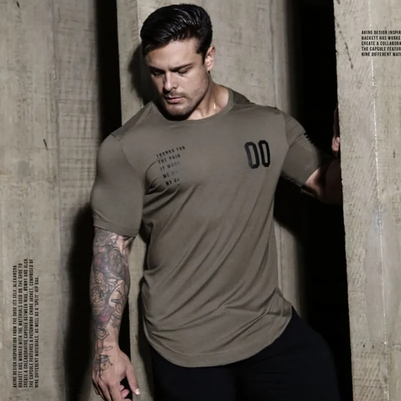 

147# New Men Fitness T-shirt Jogger Sporting Skinny Tee Shirt Male Gyms Fitness Bodybuilding Workout Black Tops Clothing