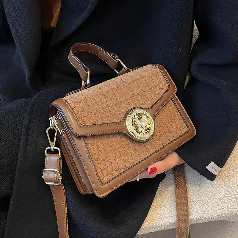 

Frosted stitching crocodile pattern PU trend small round lock single shoulder messenger portable small square bag