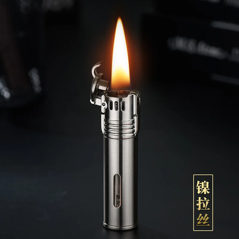 Винтажная цилиндрическая металлическая бензиновая зажигалка наблюдаемая