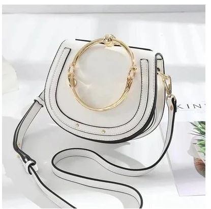 

2021 women's single shoulder oblique span bag shell handbag leather women's bag hand bag vegetable tanned leather bag
