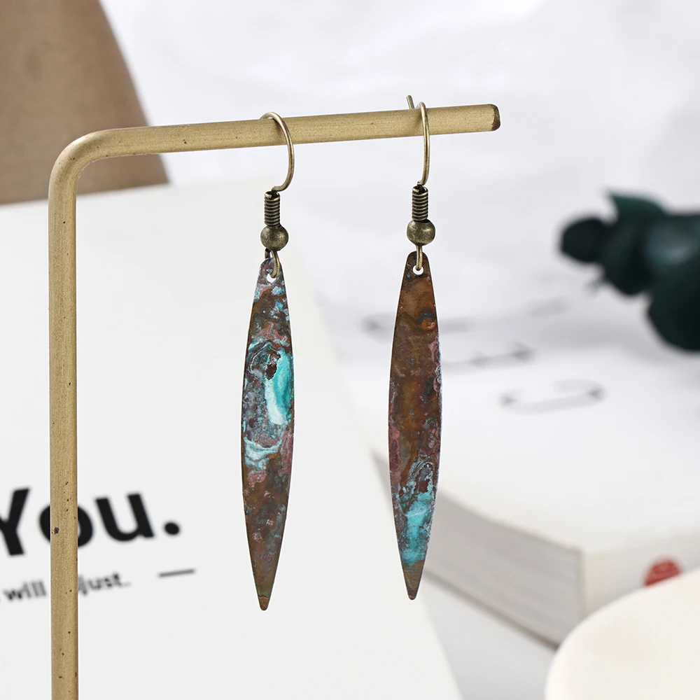 

Antique copper metal patina earring