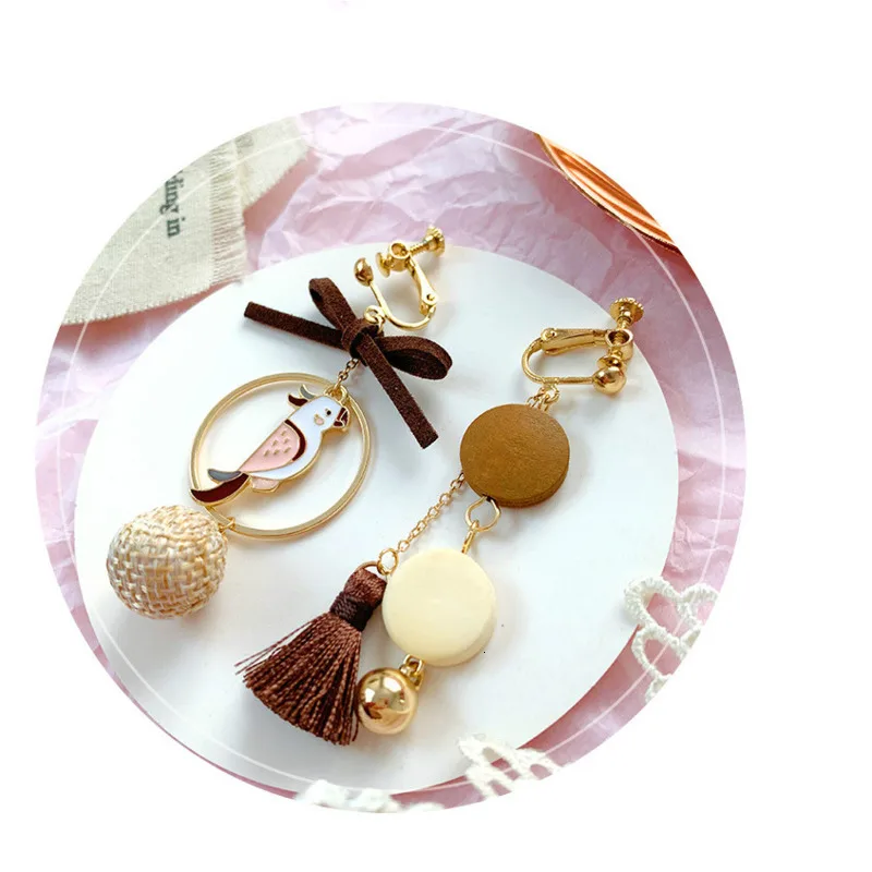 Японский бант птица дерево кисточка ассиметричная длинная без пирсинга клипсы