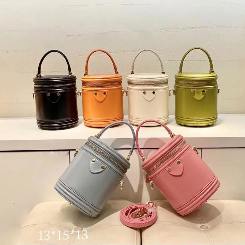 

Genuine leather bucket bag 2021 new vintage handbag fashion mini simple cylinder messenger messenger bag girl bag