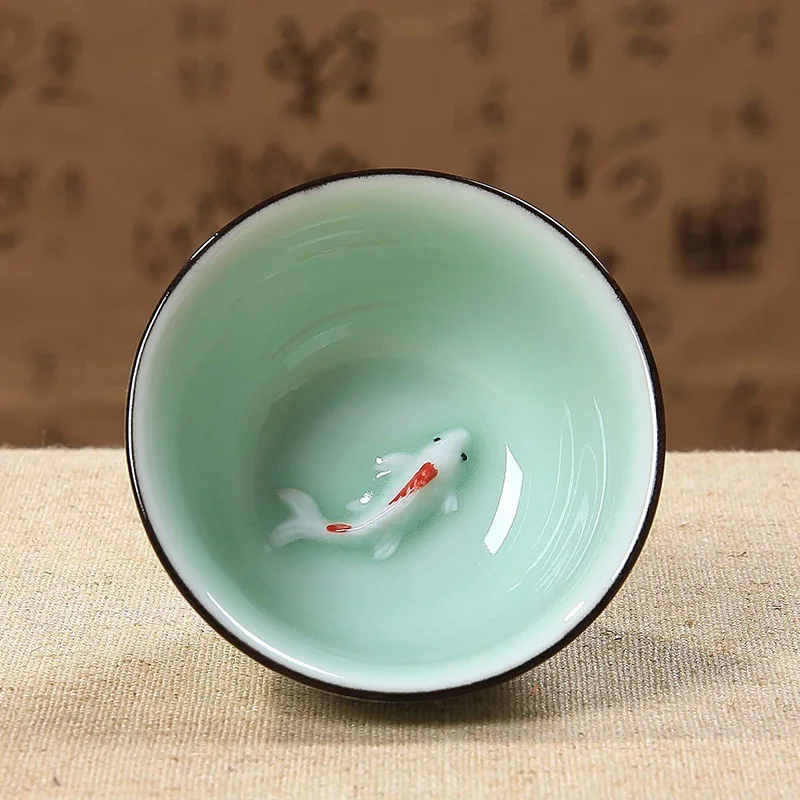 

40ml Celadon Chinese Kungfu Tea Cups Green/ Blue Embossed Carp Goldfish Teacup Small Fish Creative Ceramic Tasting Cup 6.3*3cm