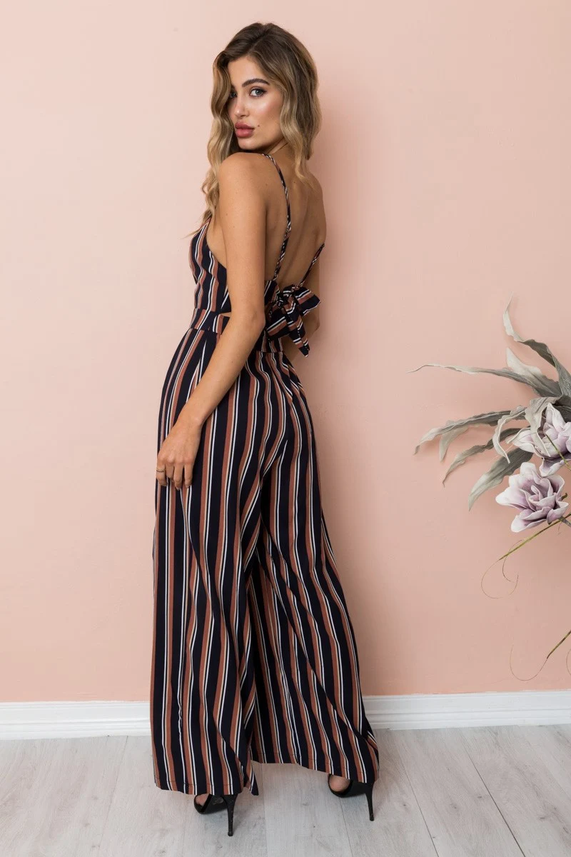 Nadafair Boho Цветочные Комбинезоны для женщин V образным вырезом спинки Лук ремень Летний Пляжный комбинезон длинные брюки