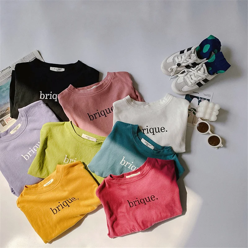 

Celveroso Spring 2021 boys and girls long-sleeved children's alphabet T shirt Korean edition round collar solid color base shirt