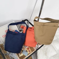 canvas large capacity shoulder bag 2021 new fashion underarm bag casual korean solid color bucket portable female bag