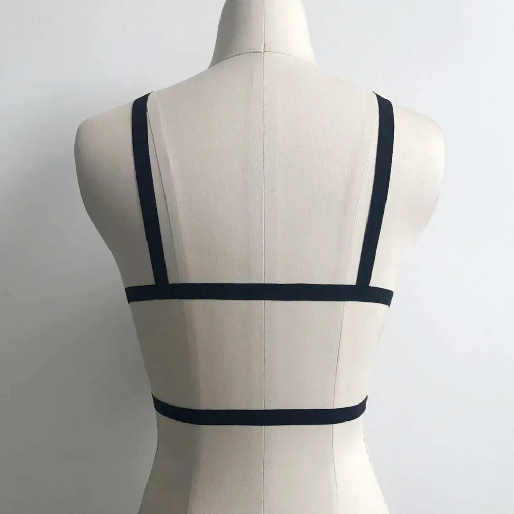 

Sexy Goth Women Garters Girl Appliques Hollow Out Elastic Cage Bra Bandage Body Belt Crop Tops Strappy Halter Bra Lingerie 2021