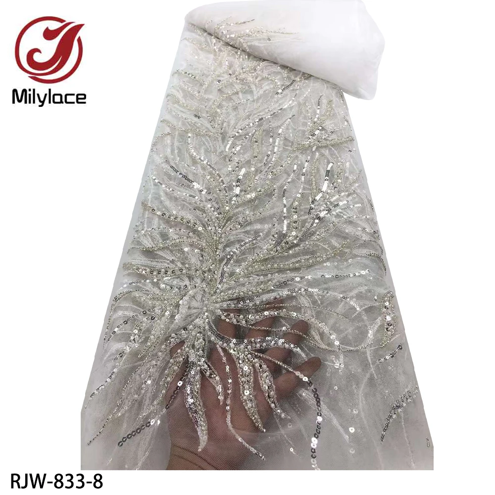 

Sequins Luxury Elegant Appearance Fabric French Tulle Lace Fabric for Wedding Gown/ Party Dress Lace Fabric RJW-833