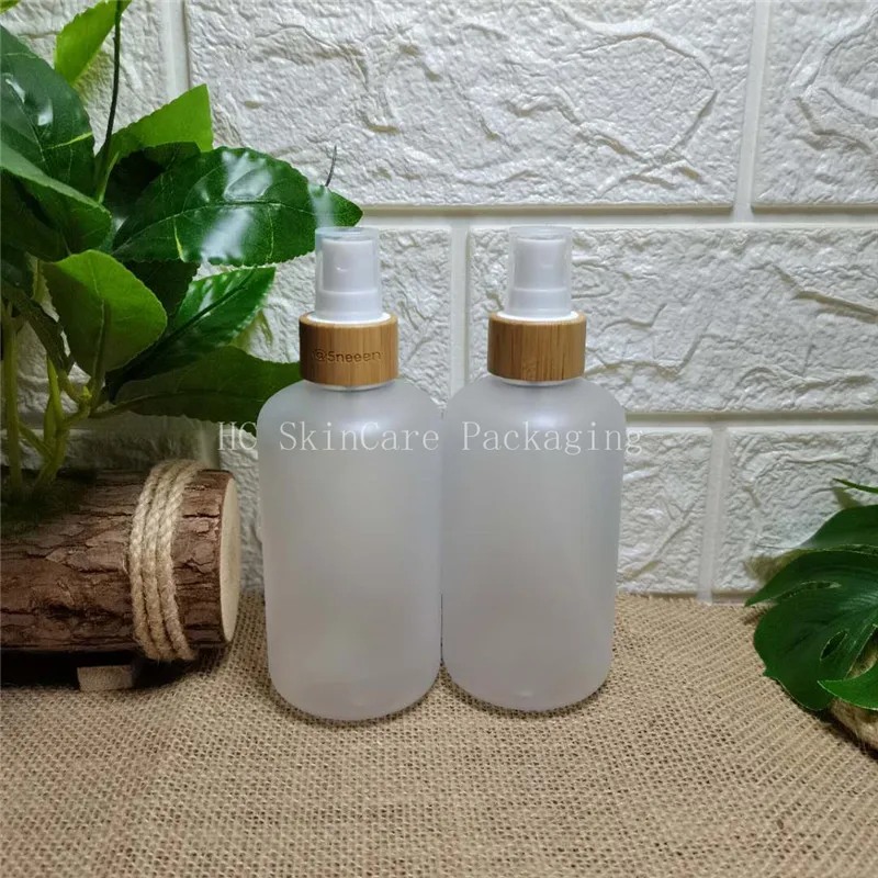 

spray bottles wholesale 250ml transparent frosted plastic bottle Environmental bamboo lid glass bottles empty cosmetic container