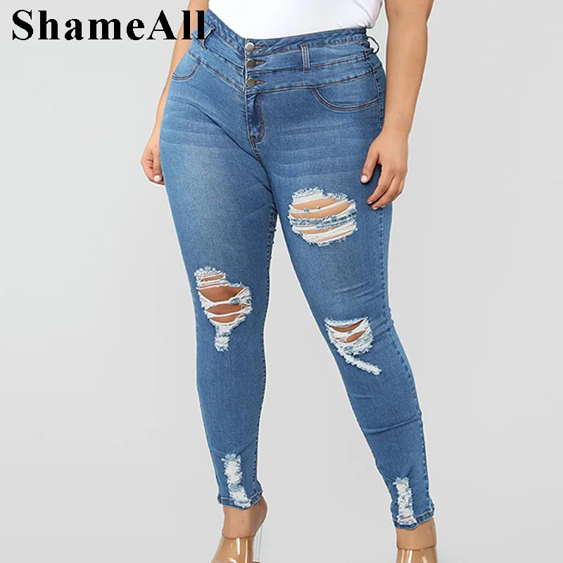 Большие размеры на пуговицах светло голубые рваные обтягивающие длинные джинсы