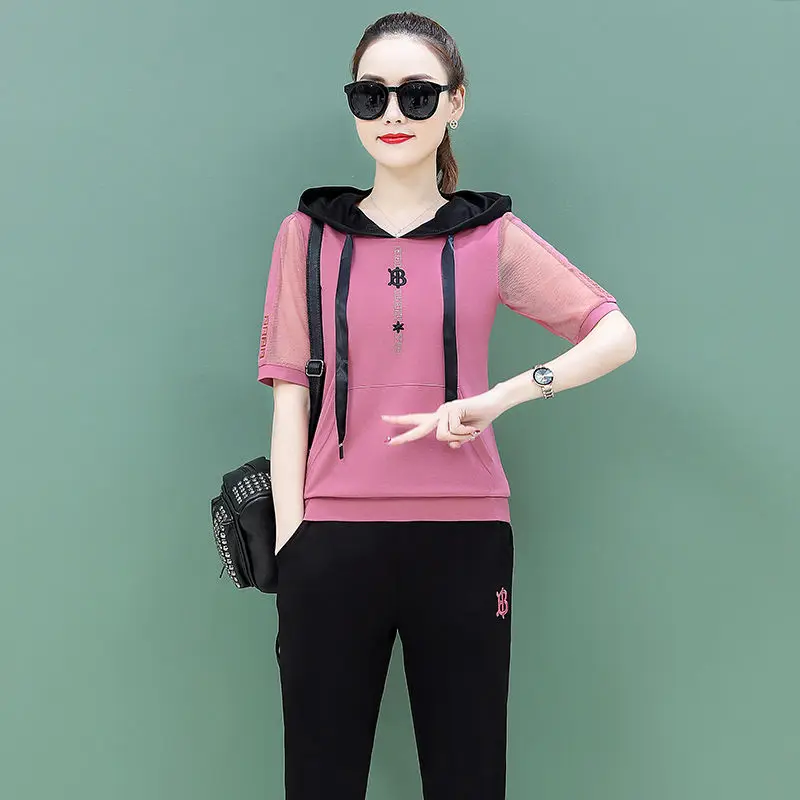 

Повседневный Спортивный костюм из 2 предметов, женский модный Свободный сетчатый пуловер с капюшоном и коротким рукавом и брюки, костюм, лет...