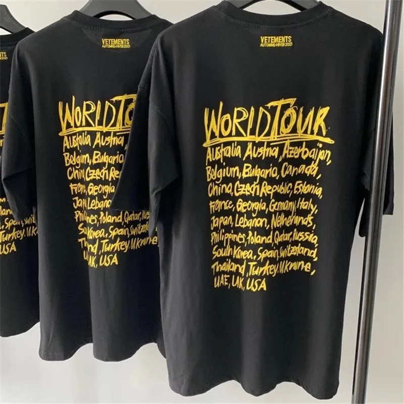 

Oversized Vetements T shirt Men Women 1:1 High-Quality Yellow Graffiti Letters World Tour City Coordinates Vetements T-shirts