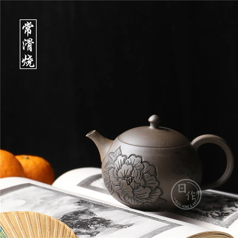 

smooth burn cause teapot are imported from Japan built feng peony butterfly tattoo lasts a Japanese kung fu tea pot