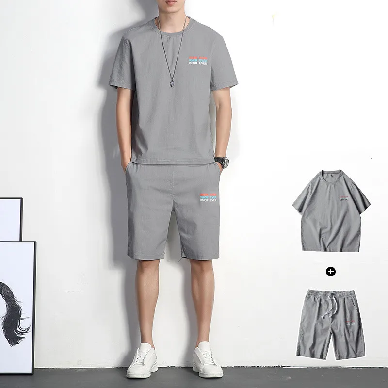 

Summer men's short-sleeved cotton and linen casual suit high-quality loose and comfortable solid color top five-point pants 2021