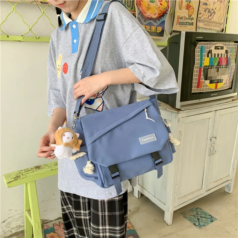 

2021 New Fashion Casual Girls Bags For Women Nylon Bookbag With Lovely Pendant Messenger Bags Cute Crossbody Bags Waterproof