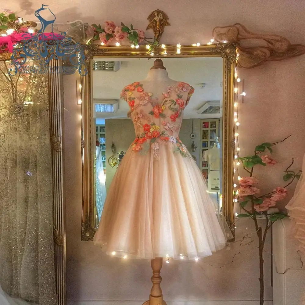 

Платье коктейльное ТРАПЕЦИЕВИДНОЕ цвета шампанского, до колена, с цветочным 3D принтом