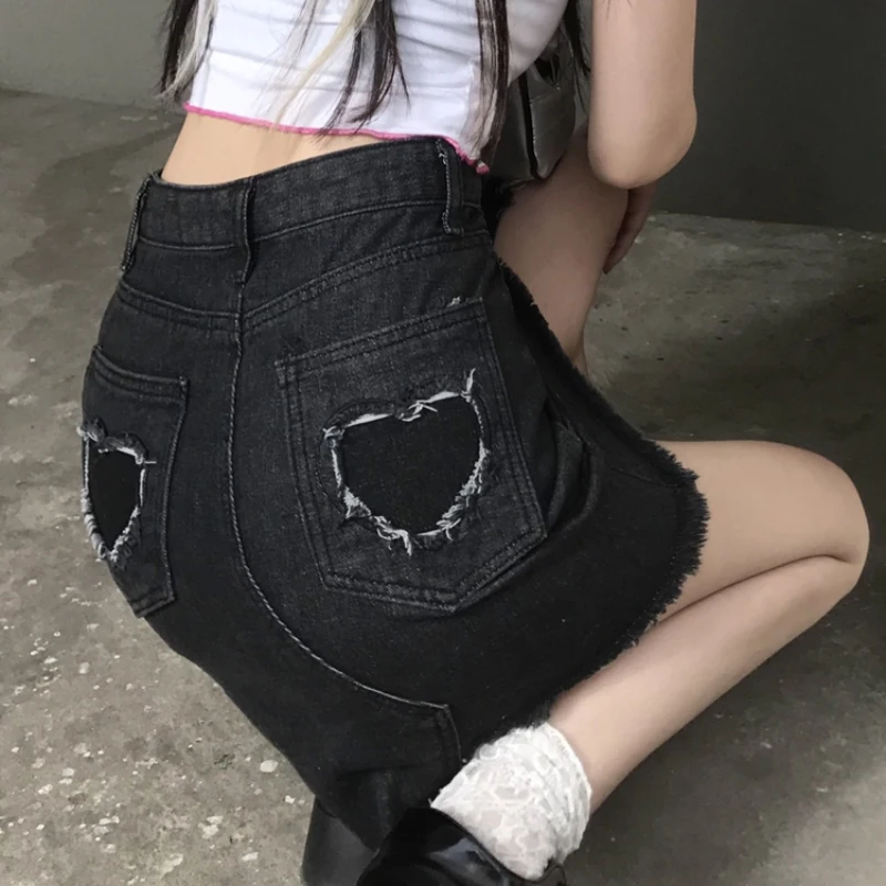 

JMPRS Black Tassel Women Denim Skirt High Waist Summer Irregular Jeans Mini Skirt Love Hole Korean Streetwear Y2k Skirt 2021