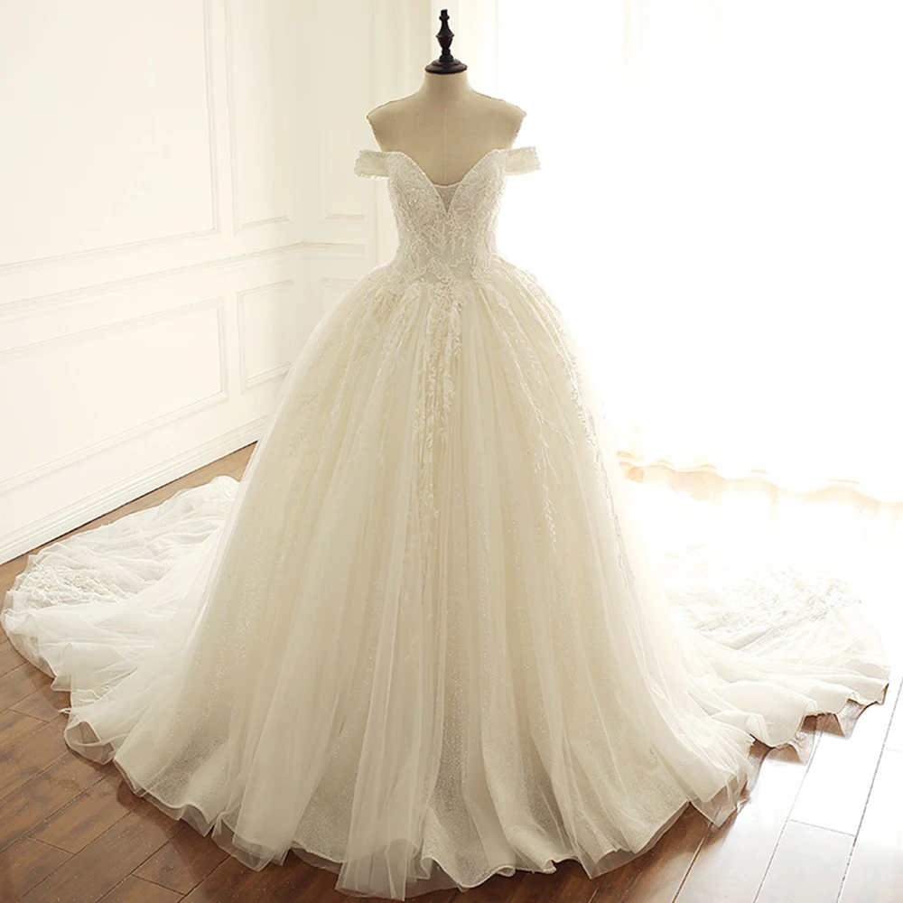 

Alibaba Princess Wedding Dresses Vestiti Da Sposa Sweetheart Neck Short Sleeve Shiny Beading Appliques Bridal Gowns Trouwjurken