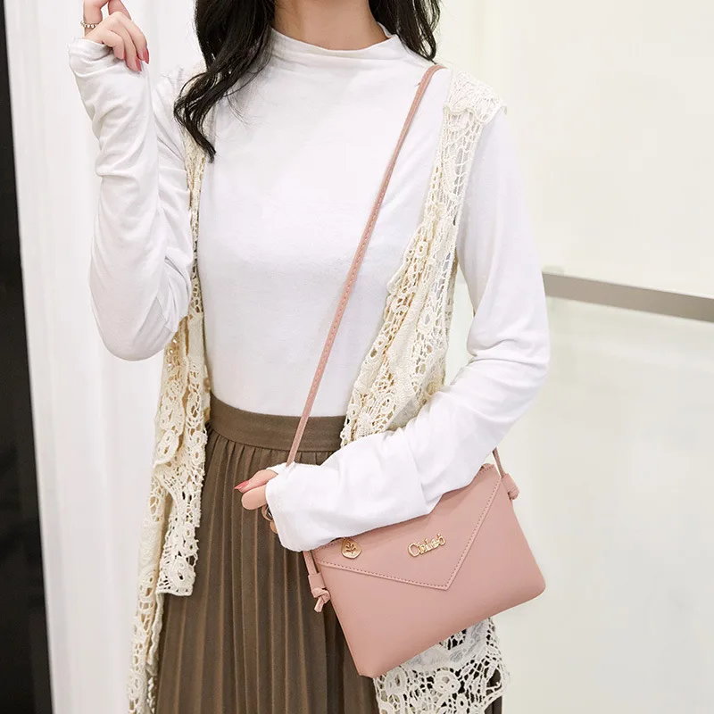 

Korean version of the new simple hardware female Shoulder Messenger Bag Casual Phone Case Small fresh small square package c100