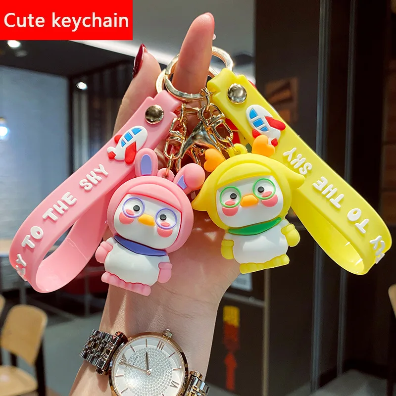 

New Fashion Cute Duck Pilot Leather Bag Car Keychain Plastic Soft Rubber Doll Pendant Key Holder Ring Accessories Jewelry Gift