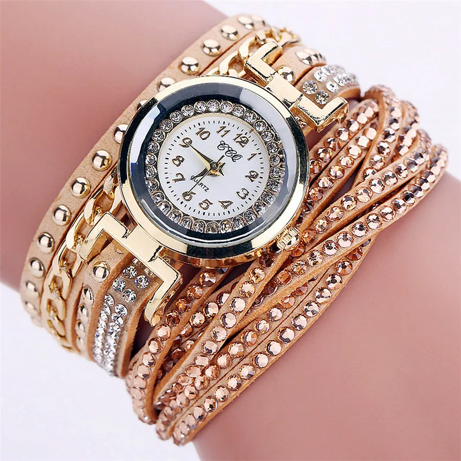 

Роскошный браслет для женщин, корейские женские наручные часы, модные золотые женские кварцевые часы с заклепками и ремешком из искусствен...