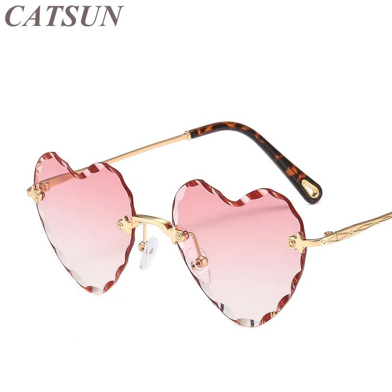 

New Fashion Personality Metal Frameless Thick Cut Edge Sunglasses Women's Heart Wave Type Inverted Edge Sexy Fashion Glasses
