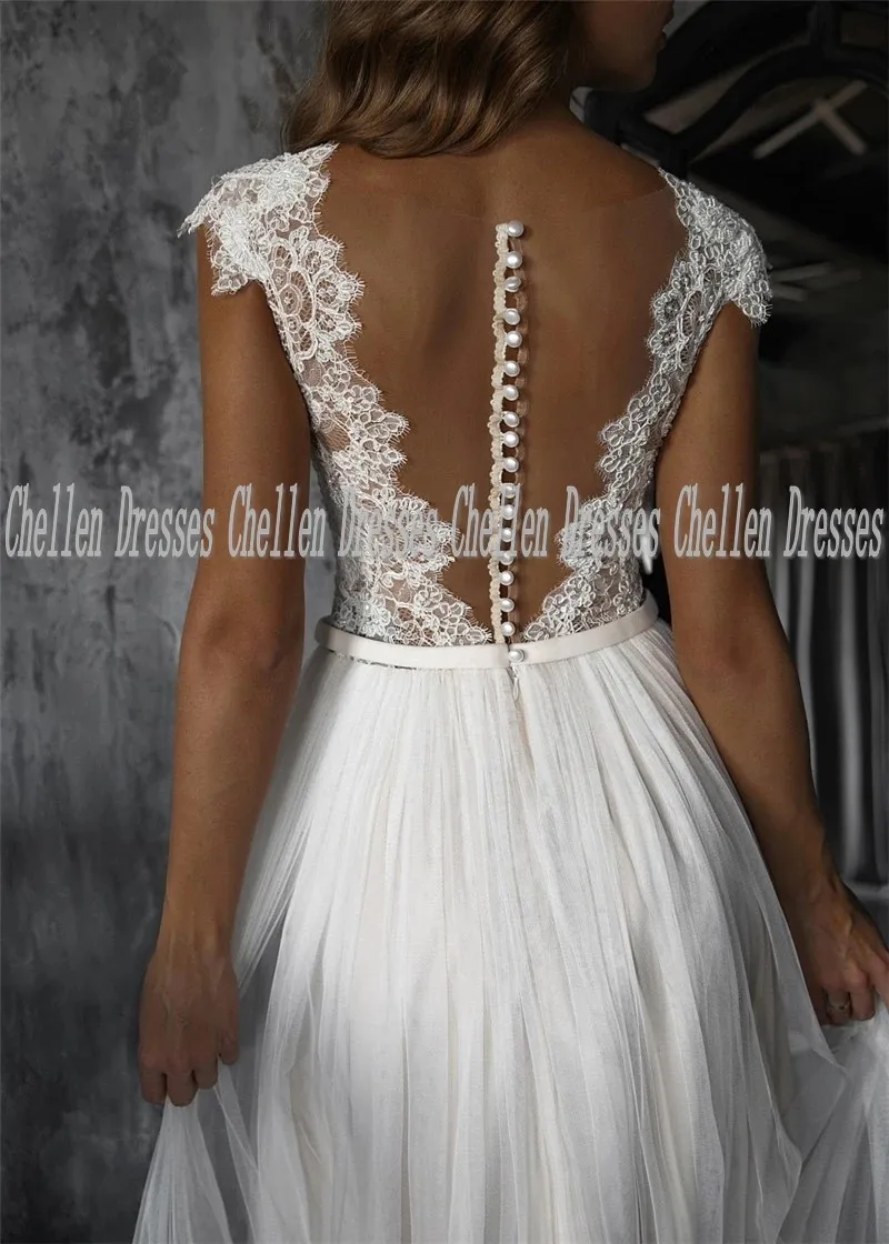 

2021 New Elegant Cap Sleeves Custom Made Lace Applique Pearl Beaded See Through Backless Tulle A-Line Beach Boho Wedding Dress