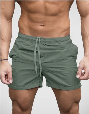 

2021 summer men's beach shorts solid color fashion casual drawstring cotton comfortable jogging fitness beachwear sports shorts