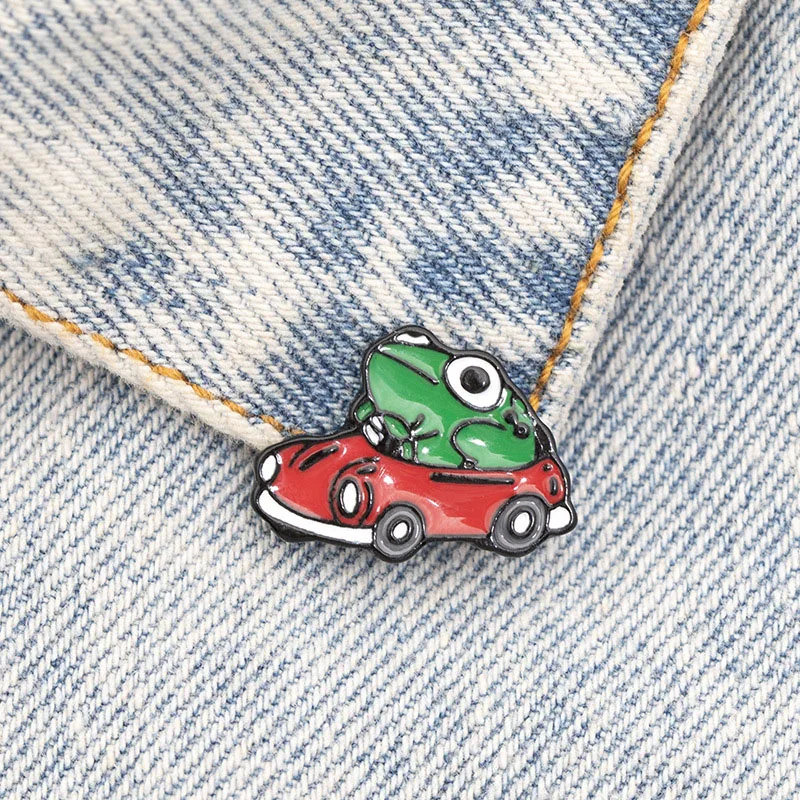 

Frog Driver Enamel Pin Small Red Car Brooch Backpack Clothes Lapel Funny Animal Frog Jewelry Gift for Friends Children