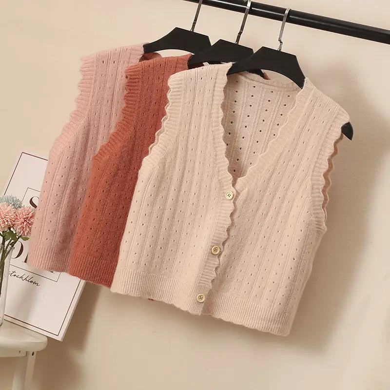 

Knitted sleeveless v-neck solid color vest women's spring and autumn loose short wavy single-breasted openwork sweater cardigan