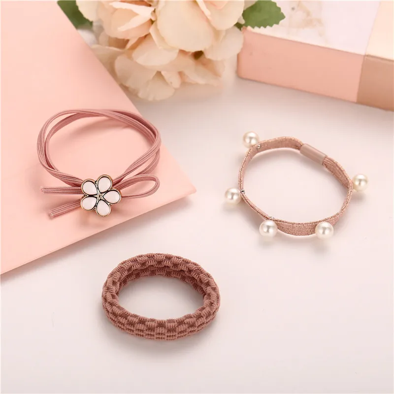 Резинки для волос с жемчугом женские базовые эластичные заколки узлом Розовые