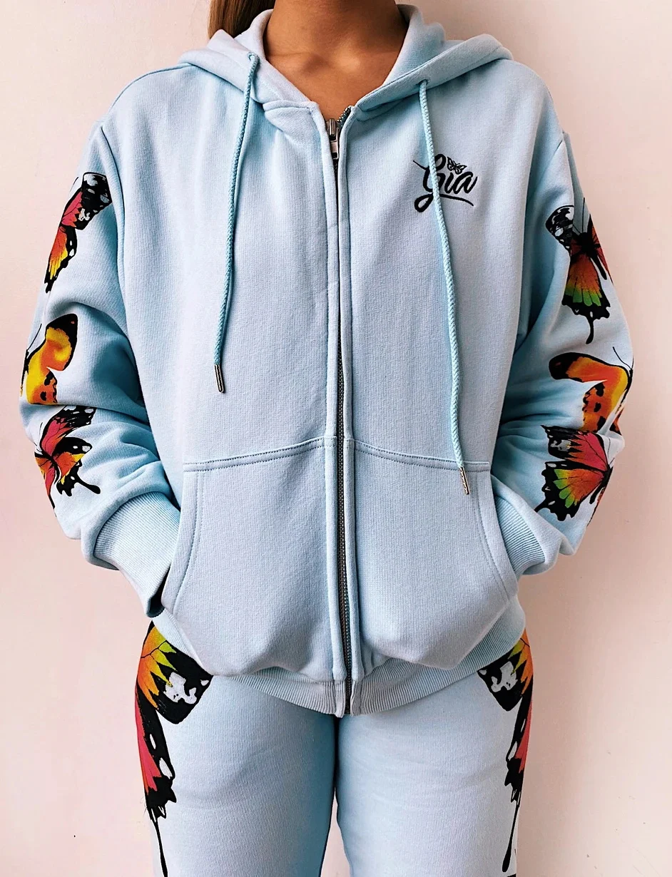 Женский спортивный костюм со штанами-бабочками укороченным топом и кофтой с