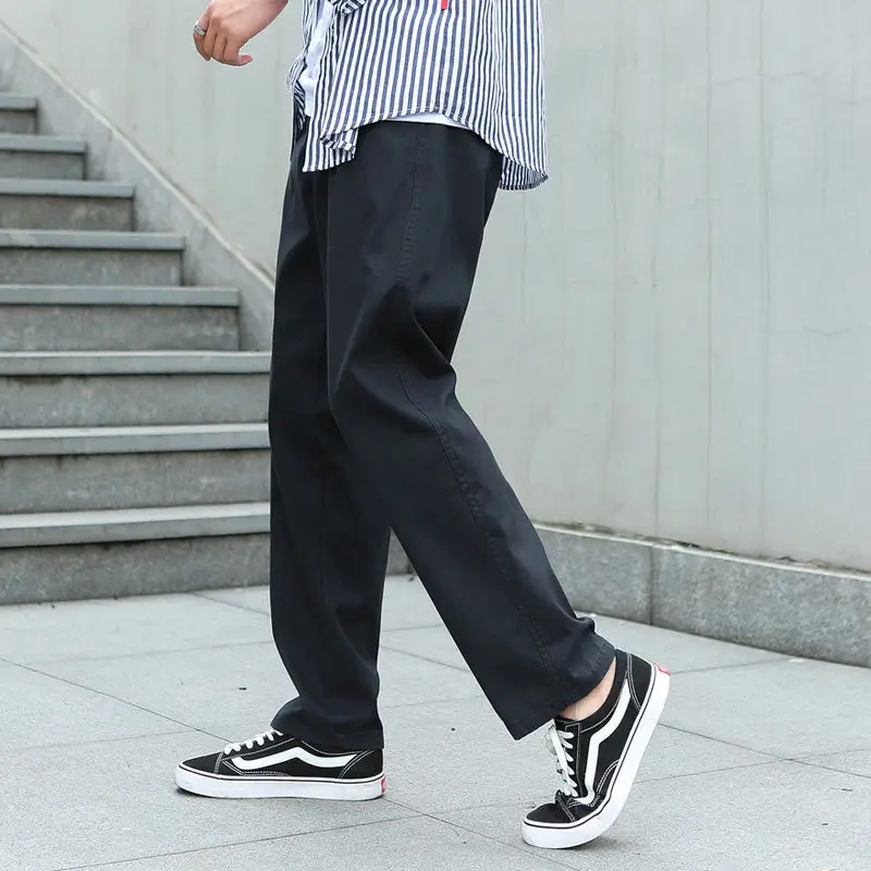 

Men's pants 2020 Autumn winter new slim solid color versatile overalls pants casual personality youth men's wear