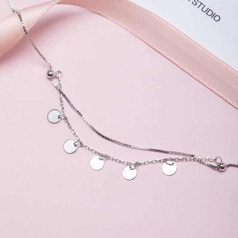 Браслет на ногу женский из серебра 925 пробы с кисточками круглые амулетные