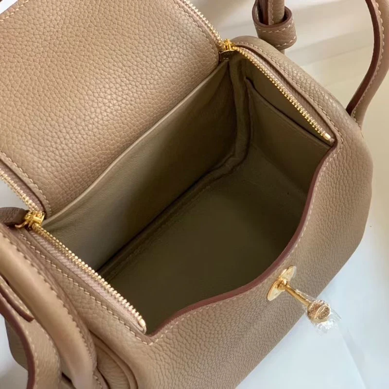 

Genuine Leather Bag Female New Net Red Togo Leather Female Bag Portable Shoulder Bag Doctor Bag