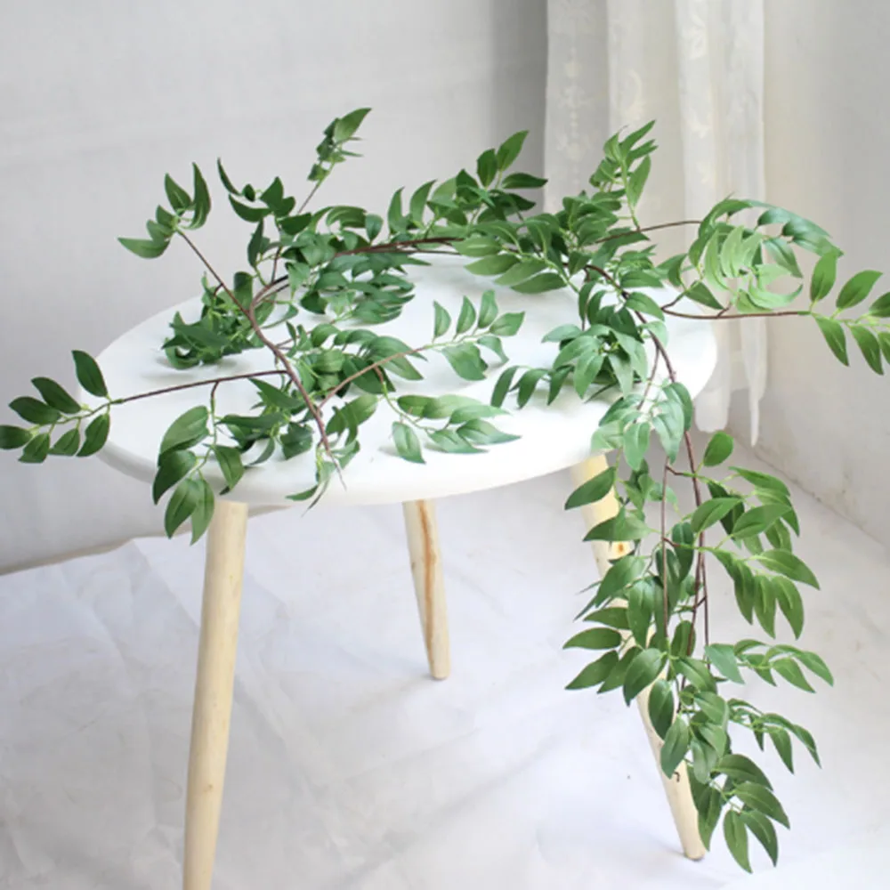 

Artificial Hanging Willow Leaves Vines Twigs Fake Silk Willow Plant Leaves Garland Wedding Decor Jungle Party Supplies Wreath1
