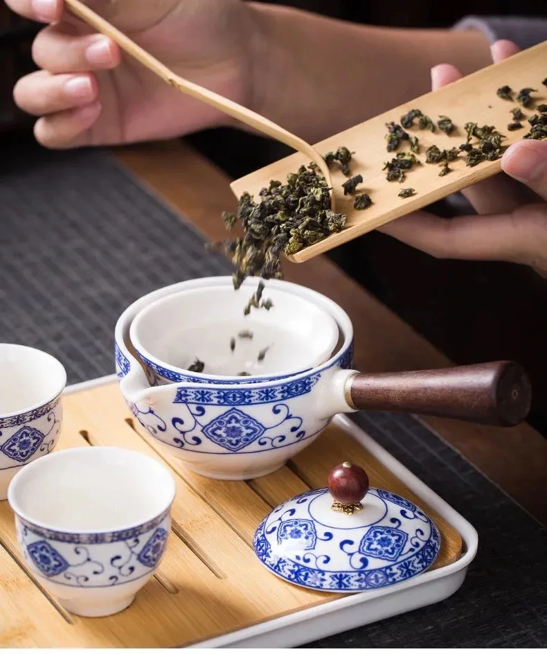 Tetera de cer&aacute;mica con mango de madera, olla con mango lateral, filtro de Kung Fu Oolong para el hogar, fabricante de t&eacute;, cer&aacute;mica negra creativa, regalos-1
