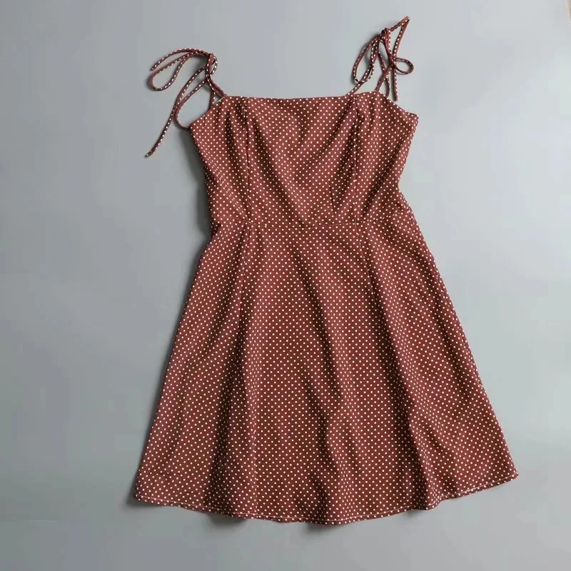 

Spring Slimmed-down Sunflower Wave Point Shoulder Tie with Flat Mouth High Waist Large Swing Skirt DLQZ1939