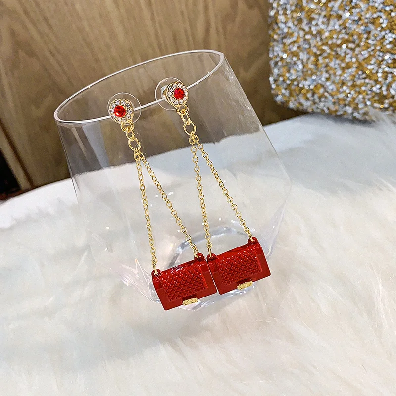 Необычные серьги кисточки с сумкой характерные трендовые Уникальные красные и