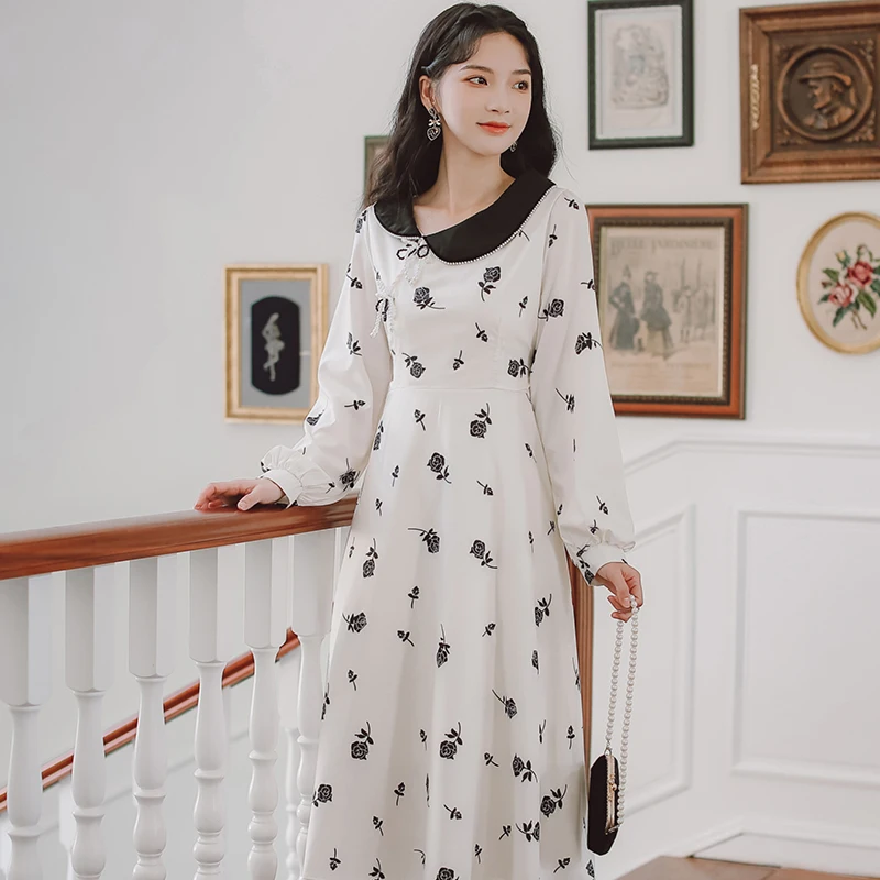 

Early Autumn Dress Hepburn Wind Rose Temperament Goddess Dress