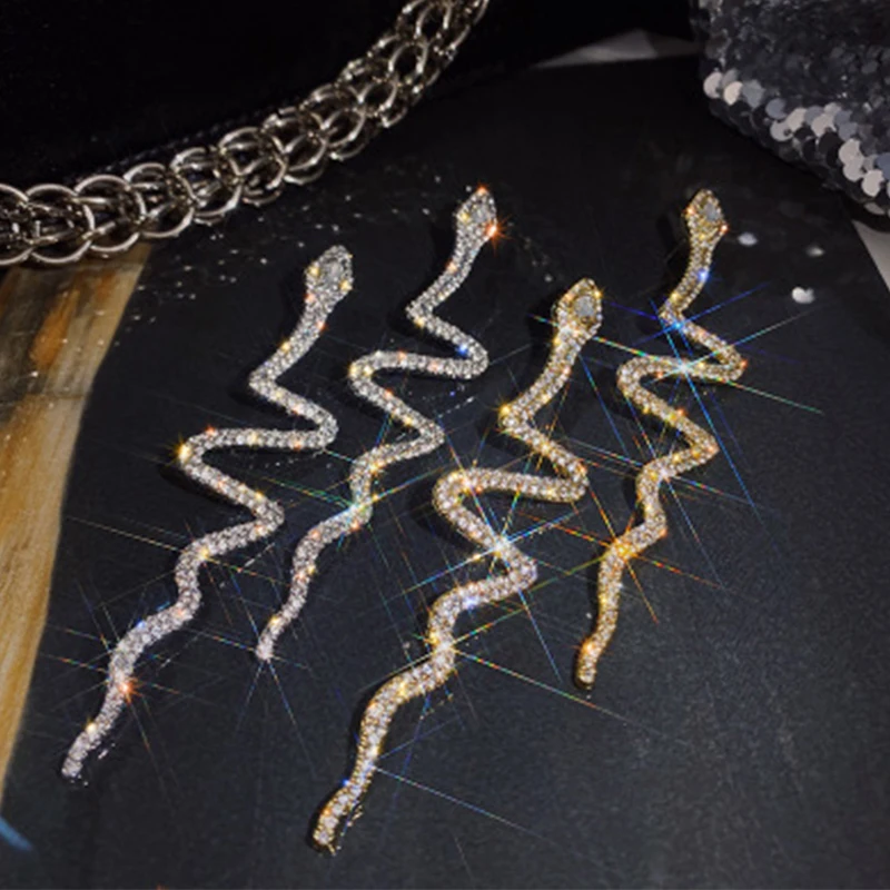 

2021 New Snake Shaped Water Filled Crystal Earrings Individual Design Long Earrings Earrings For Women Jewelry