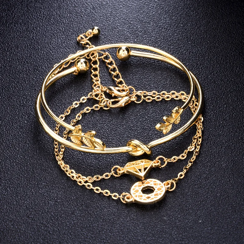 

Ofertas Popular 4PCS/Set European and American Style Leaf Knotted Carved Hollow Alloy Bracelet for Women