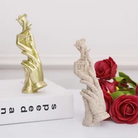 nordic light luxury modern home decoration sculpture statue resin hand held rose shape golden handicraft wedding gift decoration
