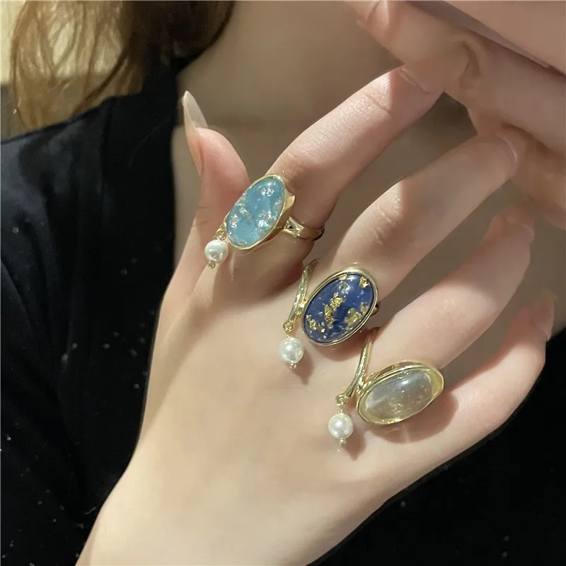 

Origin Summer French Vintage Carved Oval Simulated Pearl Ring for Women Delicate Gold Color Metallic Index Finger Ring Jewelry