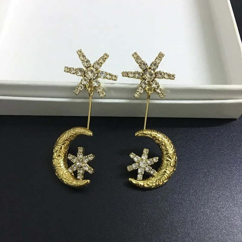 

Винтажные элегантные универсальные серьги с длинным лунным снежинкой и кристаллами