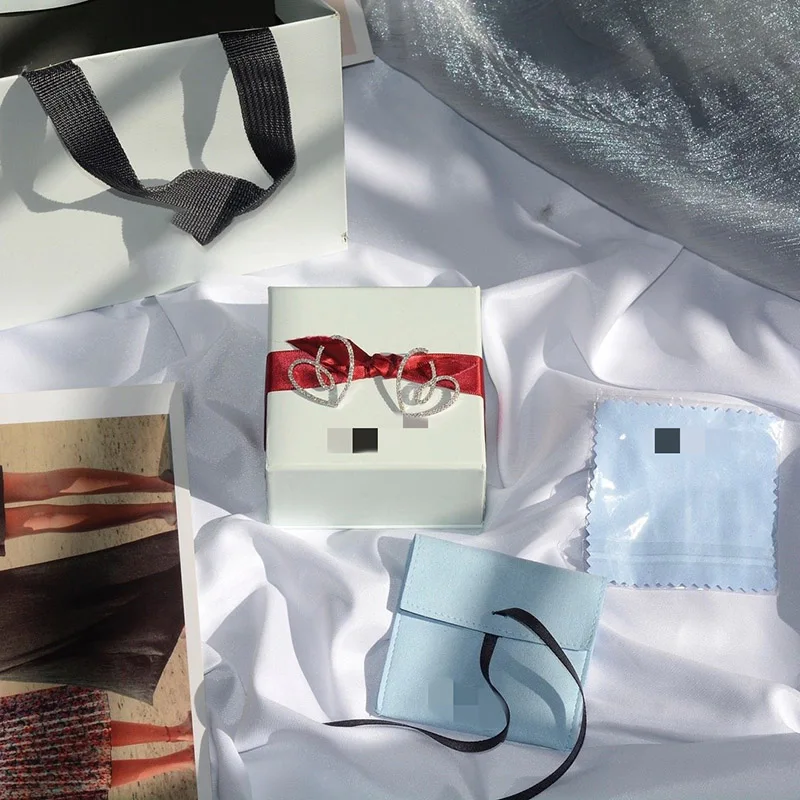 

High quality S925 silver inlaid with full diamond AAAAA zircon Love ribbon temperament earrings women's wedding party jewelry