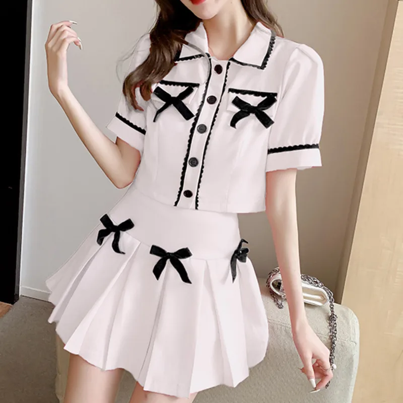 

Женский комплект из двух предметов, однобортная рубашка с бантом и коротким рукавом, короткий топ и плиссированная юбка с высокой талией, ле...